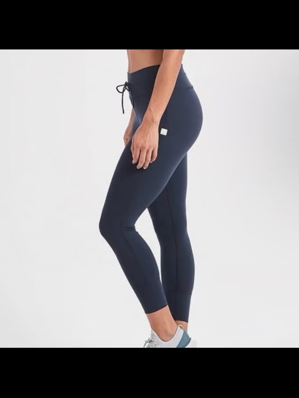Vuori Navy Performance Leggings with Beige Logo Tag